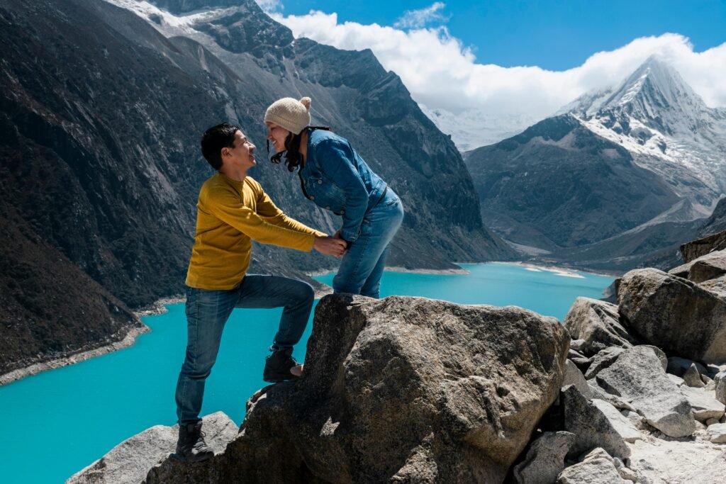 pexels-photo-13683745-13683745-1 Couple exploring the majestic snowy mountains and turquoise lakes of Huaraz, Peru.